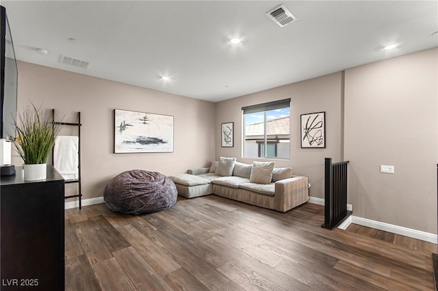 12430 Foxtail Run Ave, Las Vegas, NV 89138 - living room featuring dark wood-style flooring, baseboards, and recessed lighting