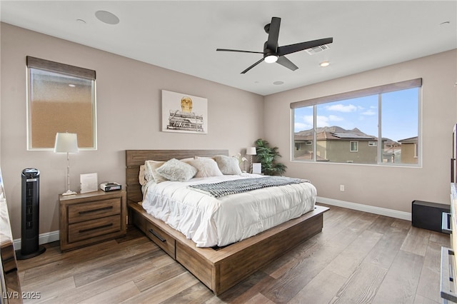 12430 Foxtail Run Ave, Las Vegas, NV 89138 - bedroom featuring light wood finished floors, baseboards, and ceiling fan