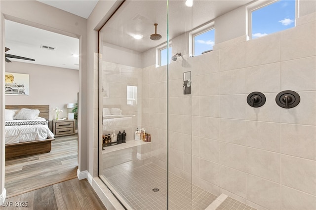 12430 Foxtail Run Ave, Las Vegas, NV 89138 - bathroom with ensuite bathroom, wood finished floors, tiled shower, and a ceiling fan