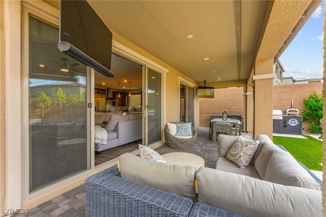 12430 Foxtail Run Ave, Las Vegas, NV 89138 - view of patio / terrace with outdoor lounge area