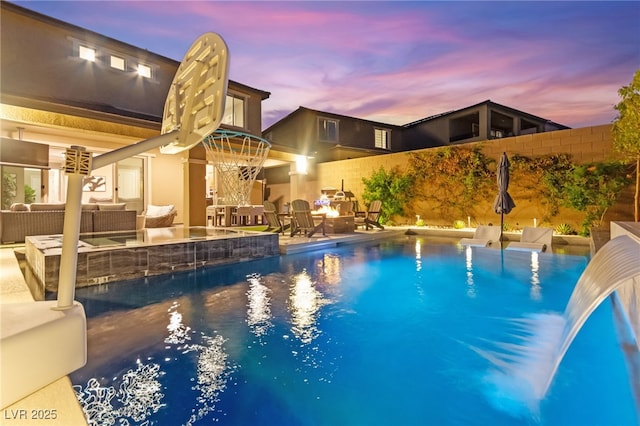 12430 Foxtail Run Ave, Las Vegas, NV 89138 - view of swimming pool featuring an outdoor hangout area, a fenced backyard, and a patio area