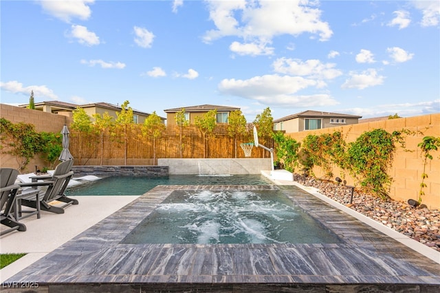 12430 Foxtail Run Ave, Las Vegas, NV 89138 - view of swimming pool featuring an in-ground hot tub and a fenced backyard