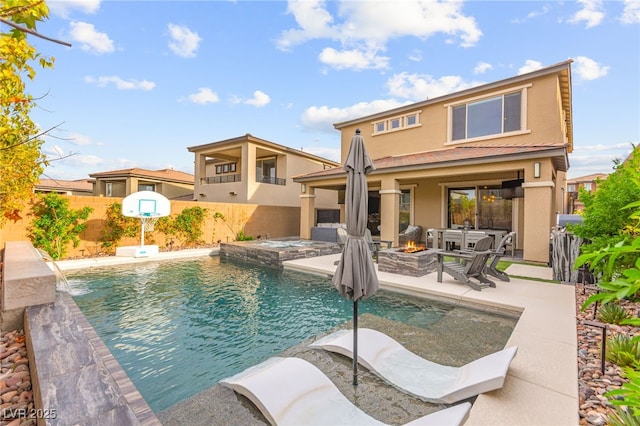 12430 Foxtail Run Ave, Las Vegas, NV 89138 - view of pool with a fire pit, a patio, a hot tub, and a fenced backyard
