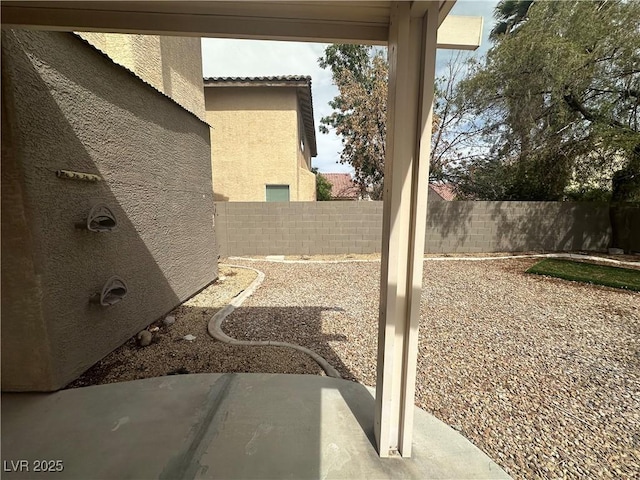 8215 Shell Beach Ct, Las Vegas, NV 89117 - fenced backyard featuring a patio area