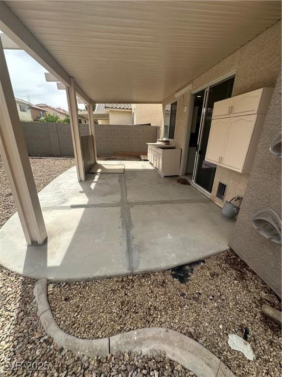 8215 Shell Beach Ct, Las Vegas, NV 89117 - fenced backyard featuring a patio