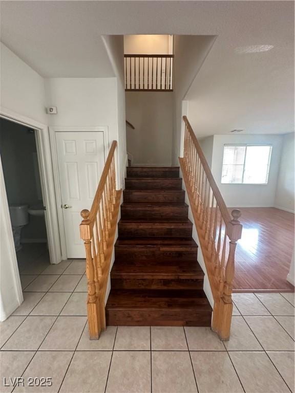 8215 Shell Beach Ct, Las Vegas, NV 89117 - stairs with tile patterned floors