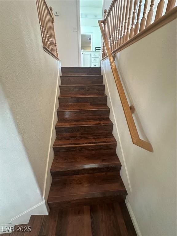 8215 Shell Beach Ct, Las Vegas, NV 89117 - stairs featuring wood finished floors and baseboards