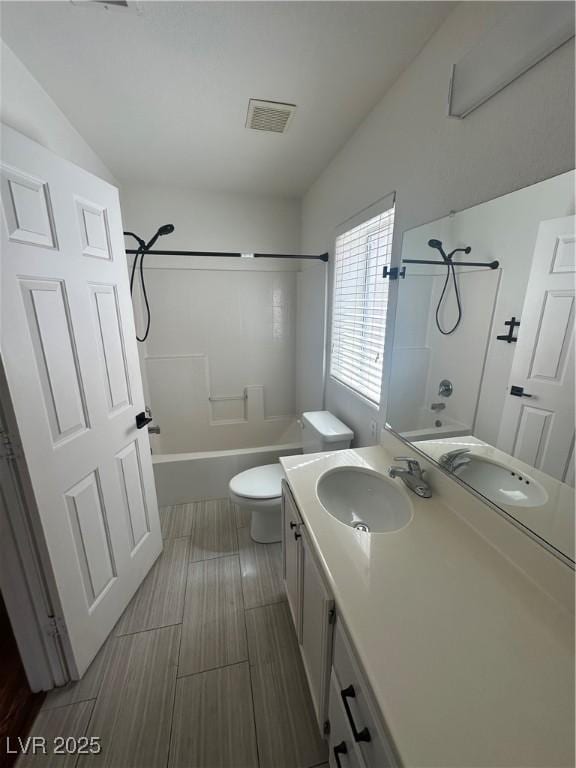 8215 Shell Beach Ct, Las Vegas, NV 89117 - full bathroom featuring shower / tub combination, vanity, and toilet