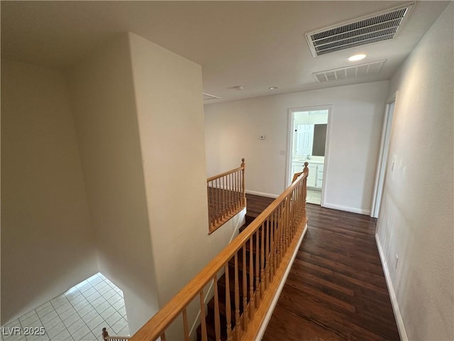 8215 Shell Beach Ct, Las Vegas, NV 89117 - hallway with an upstairs landing, wood finished floors, recessed lighting, and baseboards
