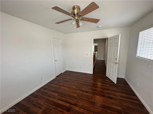 8215 Shell Beach Ct, Las Vegas, NV 89117 - unfurnished room with wood finished floors, baseboards, and ceiling fan
