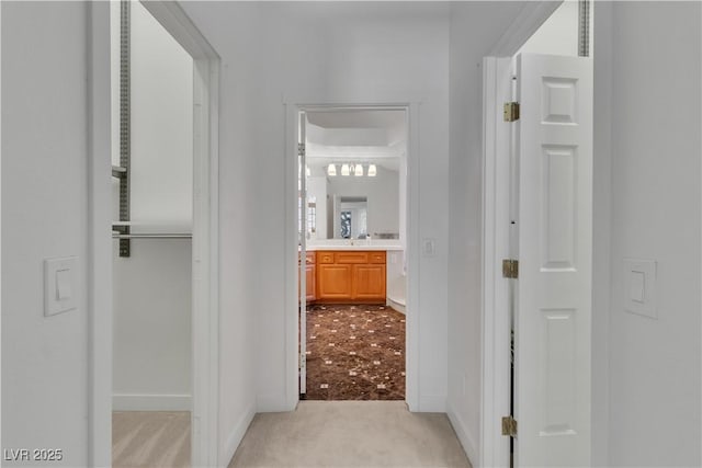 4196 Balmoral Castle Ct, Las Vegas, NV 89141 - corridor with light colored carpet and baseboards