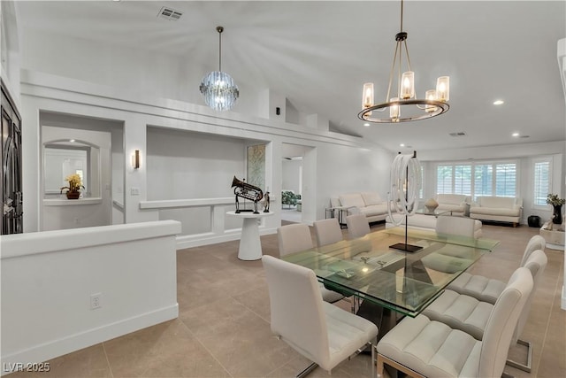 4196 Balmoral Castle Ct, Las Vegas, NV 89141 - dining room featuring a chandelier, lofted ceiling, light tile patterned flooring, recessed lighting, and baseboards