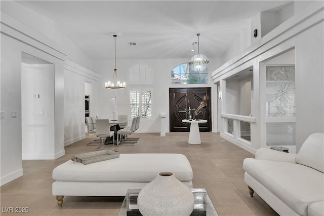 4196 Balmoral Castle Ct, Las Vegas, NV 89141 - living area featuring a chandelier and baseboards