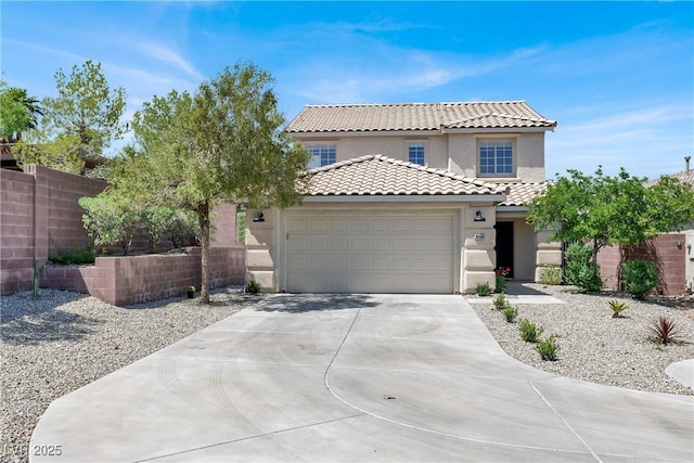 10554 Lilac Tree Ave, Las Vegas, NV 89135 - mediterranean / spanish home with stucco siding, driveway, an attached garage, and a tile roof