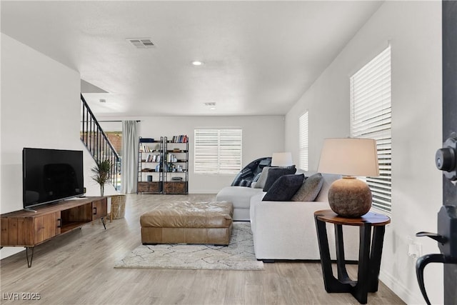 10554 Lilac Tree Ave, Las Vegas, NV 89135 - living area featuring wood finished floors and stairway