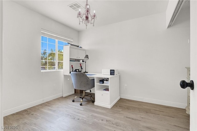 10554 Lilac Tree Ave, Las Vegas, NV 89135 - office space with a chandelier, light wood-type flooring, and baseboards