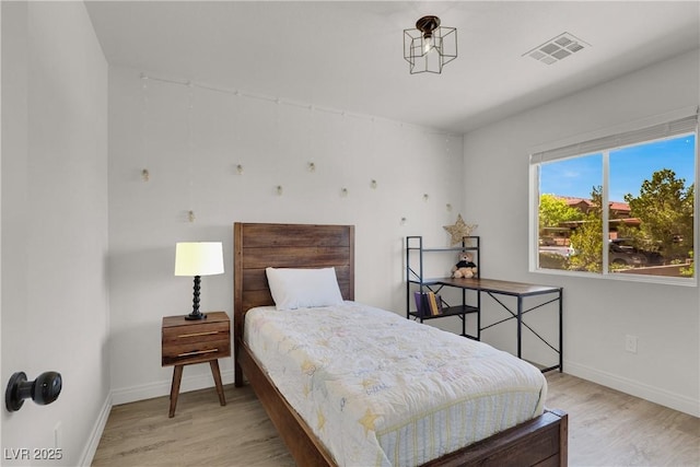 10554 Lilac Tree Ave, Las Vegas, NV 89135 - bedroom with light wood-type flooring and baseboards