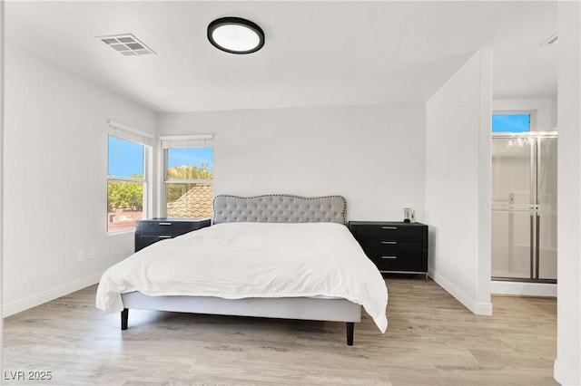 10554 Lilac Tree Ave, Las Vegas, NV 89135 - bedroom with baseboards, wood finished floors, and a baseboard heating unit