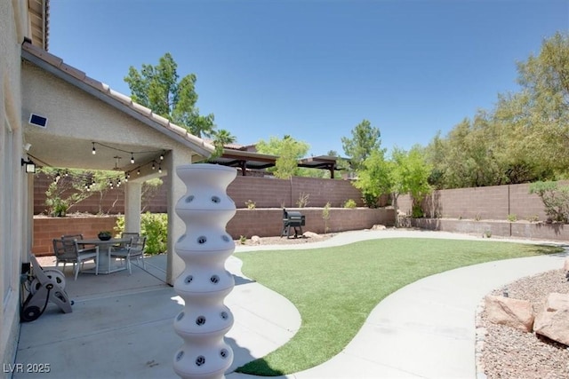 10554 Lilac Tree Ave, Las Vegas, NV 89135 - view of yard featuring a patio area and outdoor dining area
