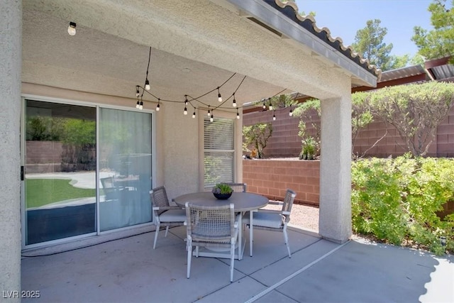 10554 Lilac Tree Ave, Las Vegas, NV 89135 - view of patio / terrace featuring outdoor dining space