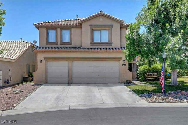8333 Valley Stream Ave, Las Vegas, NV 89131 - mediterranean / spanish-style house featuring an attached garage, stucco siding, a tile roof, driveway, and central AC unit