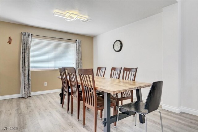 8333 Valley Stream Ave, Las Vegas, NV 89131 - dining space featuring light wood-type flooring and baseboards