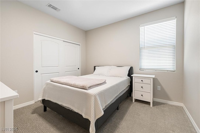 171 Palm Fox Ct, Henderson, NV 89011 - bedroom featuring light colored carpet, baseboards, and a closet