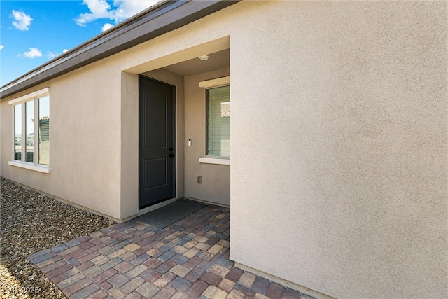 171 Palm Fox Ct, Henderson, NV 89011 - entrance to property with stucco siding and a patio