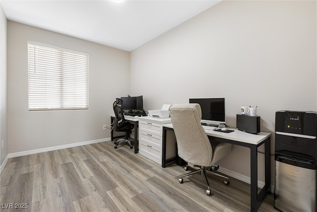 171 Palm Fox Ct, Henderson, NV 89011 - office area featuring light wood-style flooring, lofted ceiling, and baseboards