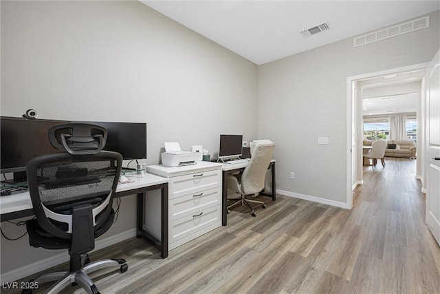 171 Palm Fox Ct, Henderson, NV 89011 - office featuring light wood-style floors, baseboards, and lofted ceiling