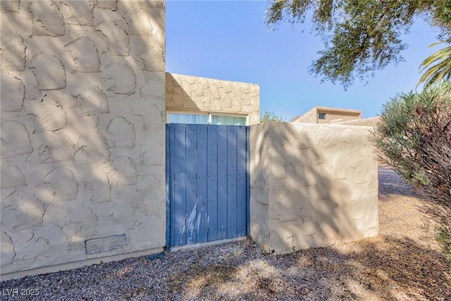 45 N Lamb Blvd, Las Vegas, NV 89110 - view of side of property with a gate