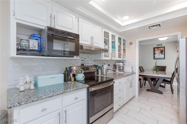 45 N Lamb Blvd, Las Vegas, NV 89110 - kitchen featuring stainless steel appliances, under cabinet range hood, decorative backsplash, white cabinetry, and glass insert cabinets