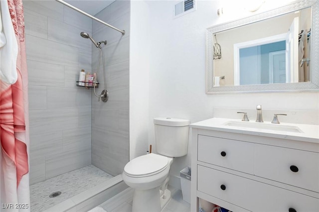 45 N Lamb Blvd, Las Vegas, NV 89110 - bathroom featuring a shower stall, vanity, and toilet