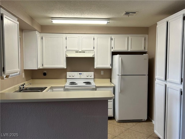6865 Tamarus St Unit 202, Las Vegas, NV 89119 - kitchen featuring white appliances, under cabinet range hood, a sink, white cabinets, and a textured ceiling