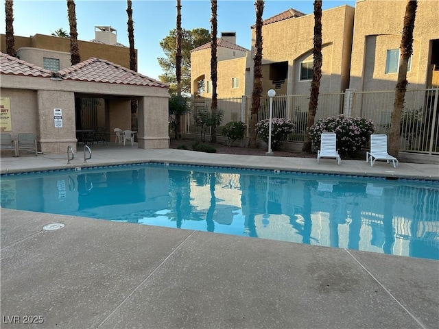 6865 Tamarus St Unit 202, Las Vegas, NV 89119 - community pool featuring a patio area