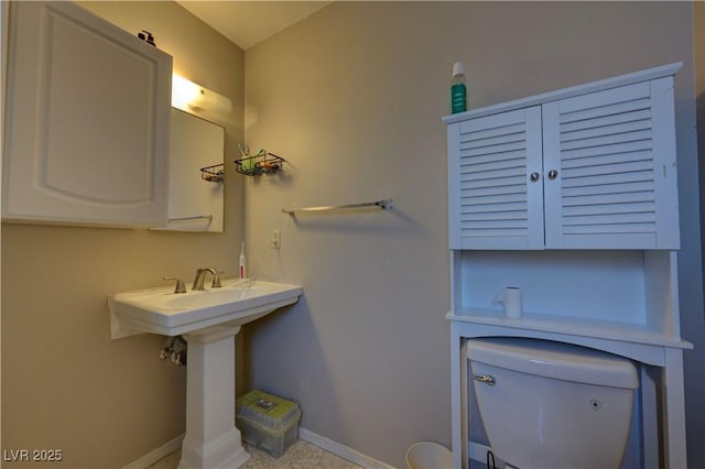 4445 Peterson Dr, Las Vegas, NV 89103 - half bath with toilet and baseboards