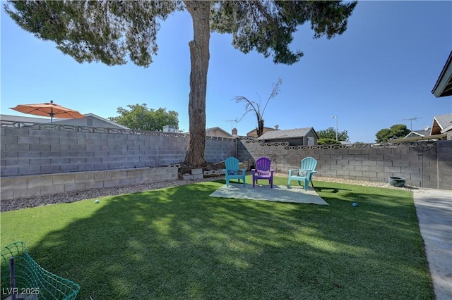4445 Peterson Dr, Las Vegas, NV 89103 - fenced backyard with a patio area