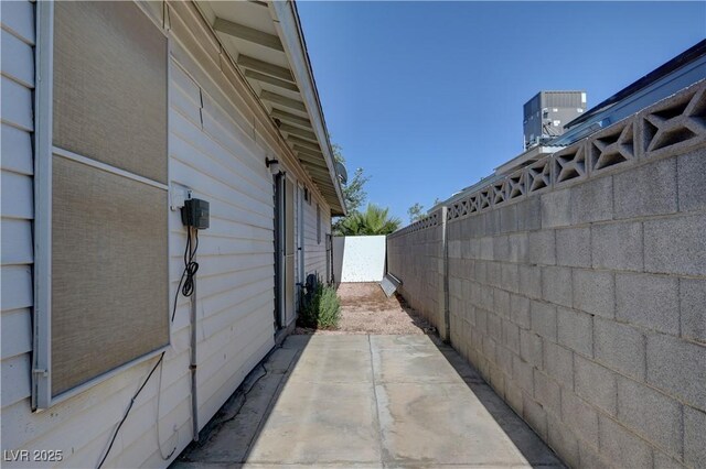 4445 Peterson Dr, Las Vegas, NV 89103 - view of home's exterior with central AC unit