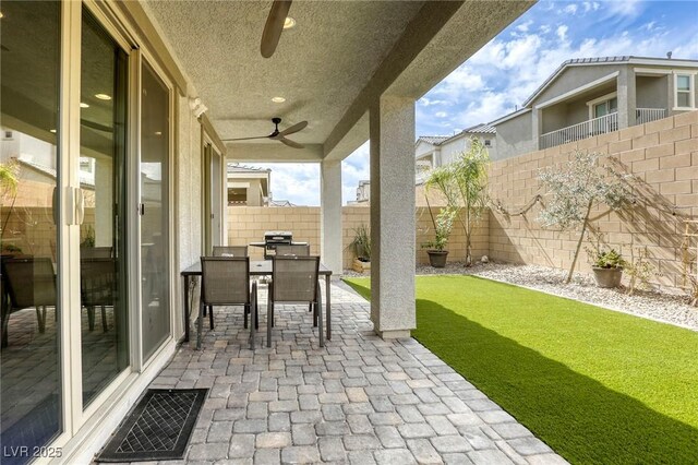 7061 Tilligerry St, North Las Vegas, NV 89084 - view of patio featuring a ceiling fan and outdoor dining space
