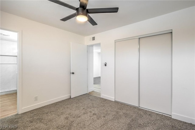 333 Rossmoyne Ave, North Las Vegas, NV 89030 - unfurnished bedroom with carpet floors, a closet, baseboards, and a ceiling fan
