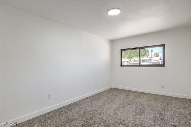333 Rossmoyne Ave, North Las Vegas, NV 89030 - carpeted spare room featuring baseboards