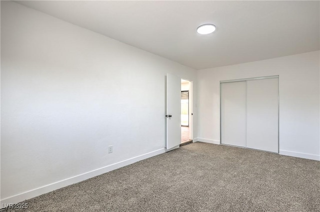333 Rossmoyne Ave, North Las Vegas, NV 89030 - unfurnished bedroom with carpet, baseboards, and a closet