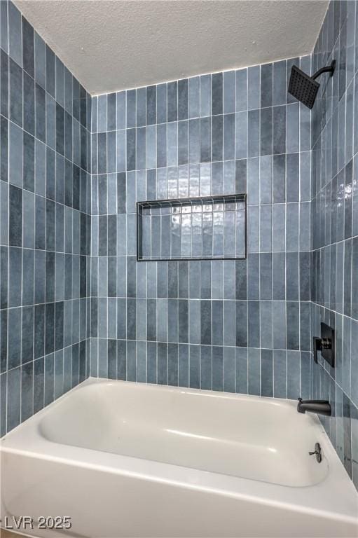 333 Rossmoyne Ave, North Las Vegas, NV 89030 - bathroom featuring a textured ceiling and bathtub / shower combination