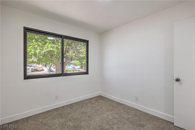 333 Rossmoyne Ave, North Las Vegas, NV 89030 - empty room with baseboards and carpet floors