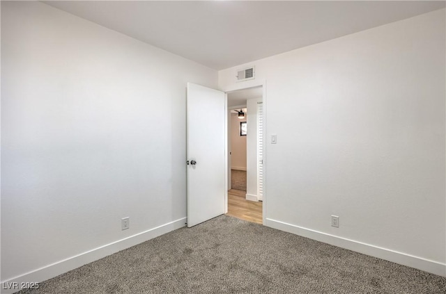 333 Rossmoyne Ave, North Las Vegas, NV 89030 - spare room featuring light colored carpet and baseboards