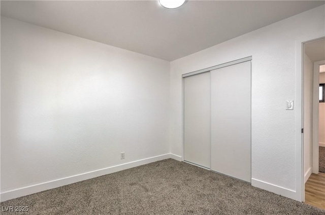 333 Rossmoyne Ave, North Las Vegas, NV 89030 - unfurnished bedroom with carpet floors, a closet, and baseboards