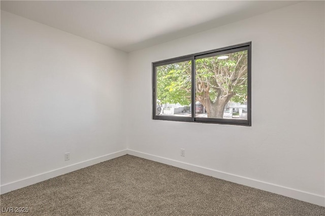 333 Rossmoyne Ave, North Las Vegas, NV 89030 - carpeted empty room with baseboards