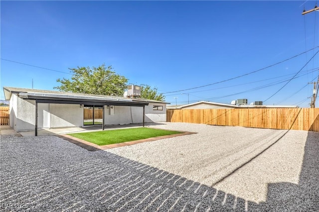 333 Rossmoyne Ave, North Las Vegas, NV 89030 - back of house with a patio and stucco siding