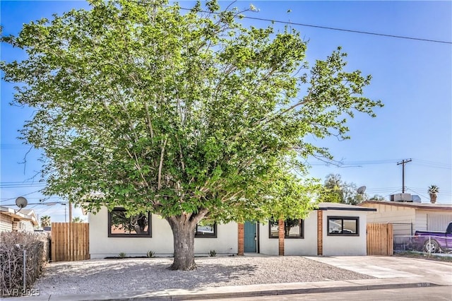 333 Rossmoyne Ave, North Las Vegas, NV 89030 - obstructed view of property with stucco siding