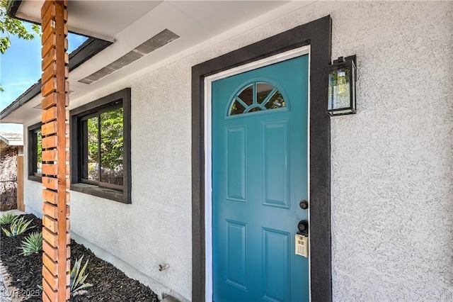 333 Rossmoyne Ave, North Las Vegas, NV 89030 - view of exterior entry featuring stucco siding
